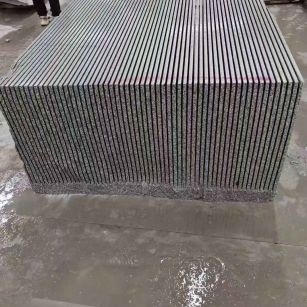 吕梁芝麻白毛板荒料切割